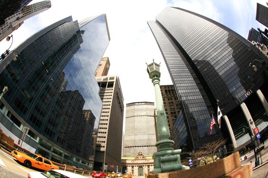 New York City, April 17, 2009: The skyscrapers on famous Park Avenue near grand central station in NYC (a fisheye view)