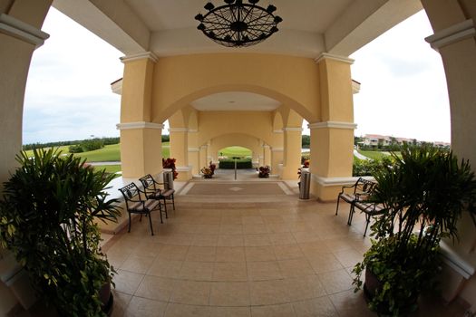a front gate of a Cancun resort, a fisheye view