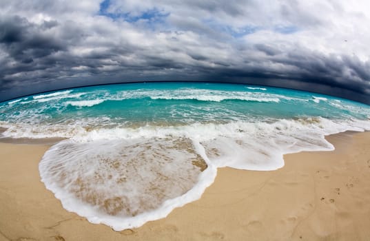 The beach front at a luxury beach resort in Cancun Mexico, a fisheye view