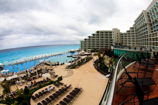 The beach front at a luxury beach resort in Cancun Mexico, a fisheye view