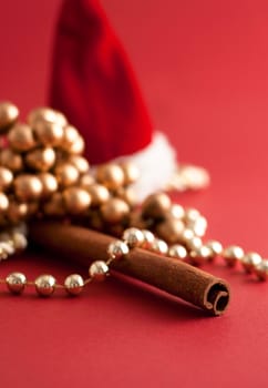 Chains, Santa Claus hat and cinnamon stick