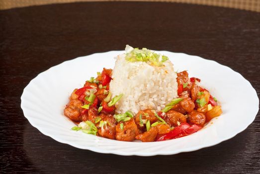 Pork meat and vegetables and pineapple with japanese rice