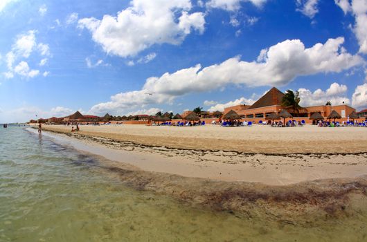 The beach front at a luxury beach resort in Cancun Mexico