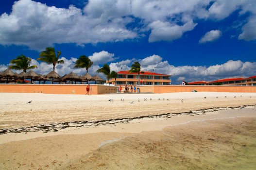 The beach front at a luxury beach resort in Cancun Mexico