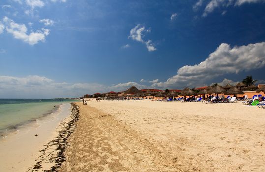 The beach front at a luxury beach resort in Cancun Mexico