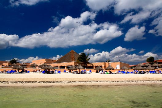 The beach front at a luxury beach resort in Cancun Mexico