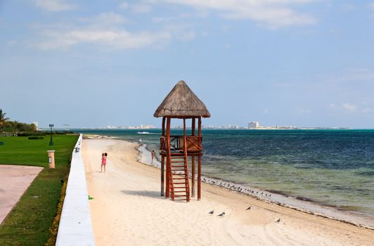 The beach front at a luxury beach resort in Cancun Mexico