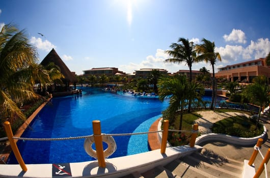 a fish-eye view of a luxury all inclusive beach resort in Cancun Mexico