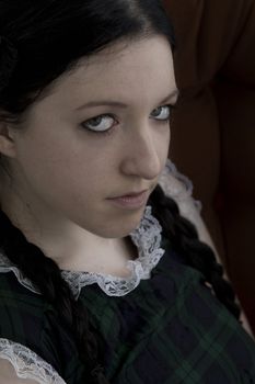 Pale looking girl with braided hair