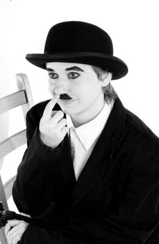 Girl plays the role of Charles Chaplin