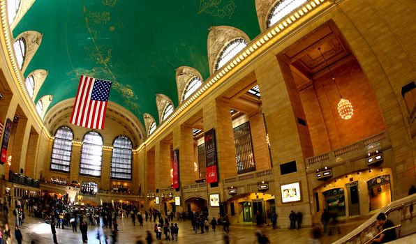 New York City, April 17, 2009: commuters and tourists flooded the grand central station during the Friday afternoon rushhour (a fisheye view)