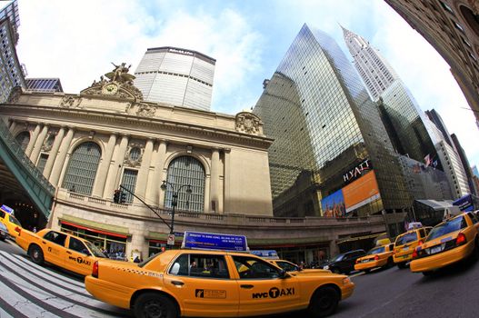 New York City, April 17, 2009: commuters and tourists rushing in front of the grand central station during the Friday afternoon rushhour (a fisheye view)