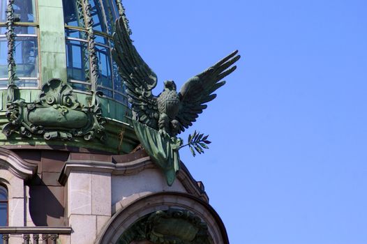 Statue of a american bald eagle on building in Saint-Petersburg, Russia.