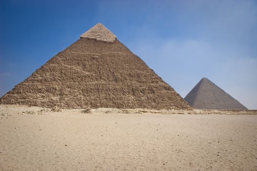 The Pyramid of Khafrae is the second largest of the Ancient Egyptian Pyramids of Giza and the tomb of the fourth-dynasty pharaoh Khafre (Chephren in Greek),  The pyramid sits on bedrock 10 m (33 ft) higher than Khufu's pyramid, which makes it appear to be taller.