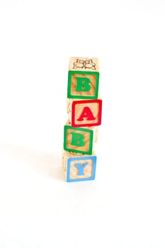 Vintage alphabet blocks spelling out BABY