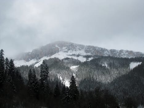 The main Caucasian ridge; rocks; a relief; a landscape; a hill; a panorama; high mountains; peaks; caucasus; top; a slope