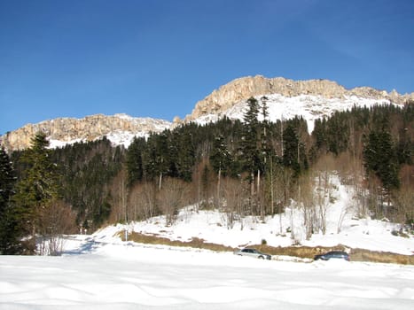 The main Caucasian ridge; rocks; a relief; a landscape; a hill; a panorama; high mountains; peaks; caucasus; top