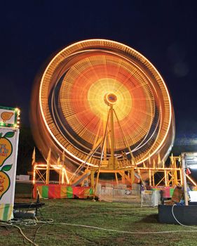 The beautiful light trails at night in a county carnival in New Jersey