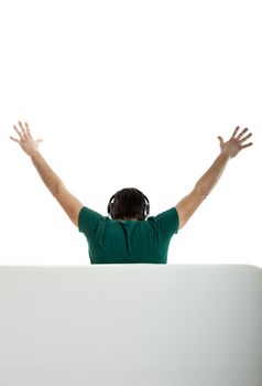 Back view from a young man seated on the couch 