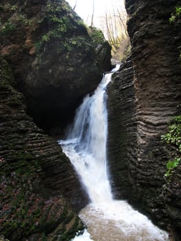 Falls; mountains; caucasus; the river; a stream; splashes; a moisture; a stream; water; rocks; a relief; the nature