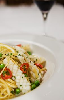 A seafood pasta with fresh chili and vegetables