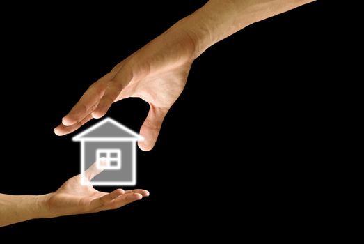 Big hand give the house icon to small hand with black background