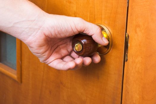 wooden handle of the door