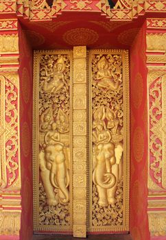 Buddhist temple door decoration in Ta-khag City, Champasak Province, Southern of Laos