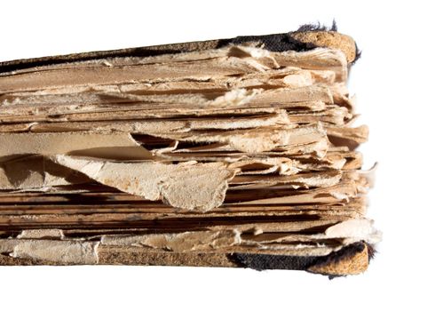 An old book with a crumpled sheet and hardcover isolated on white background