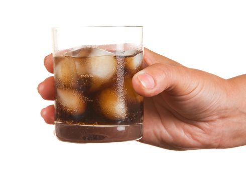 Carbonated water with ice in a glass isolated on white background