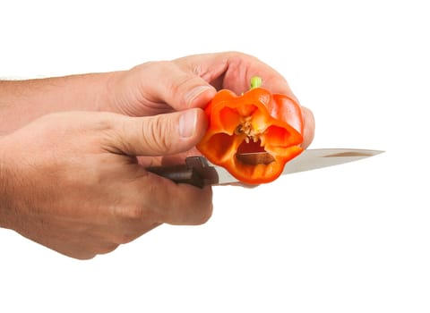 paprika with a knife in his hands isolated on white background