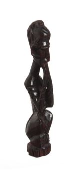 African statue of black wood isolated on white background