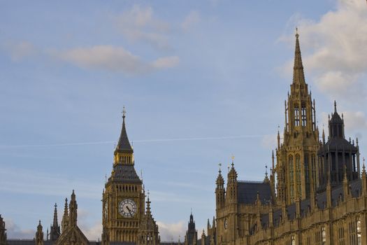 Big Ben and the Houses of Parliament set against a beautiful blue sky with purple skies.