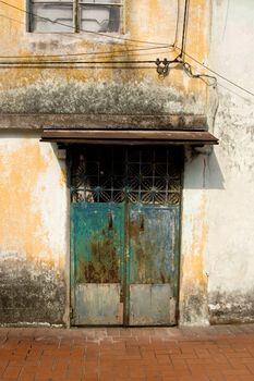 Old door in Coloane, Macao. A ghost town now that the casinos nearby has attracted all the young people.