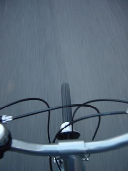 Taken while riding a bicycle. Even though it wasn't taken at a very high speed, it conveys a feel of speed.