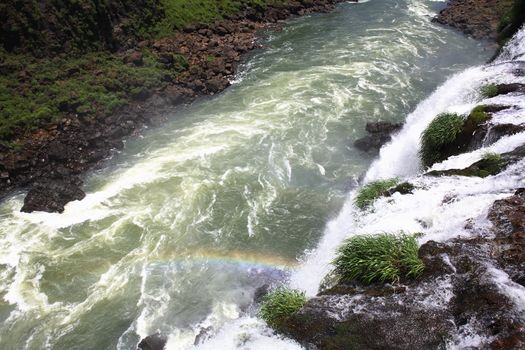 The Iguassu (or Iguazu) Falls is one of the largest masses of fresh water on the planet and divides, in South America, Brazil, Paraguay and Argentina. The waterfall system consists of 275 falls along 2.7 kilometres (1.67 miles) of the Iguazu River. Some of the individual falls are up to 82 metres (269 feet) in height, though the majority are about 64 metres (210 feet).