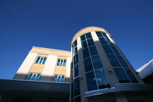 Modern building on a background of the dark blue sky