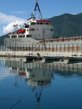 Cargo ship with reflection