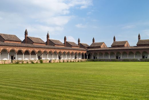 Carterhouse of Pavia, cell complex over a grass field