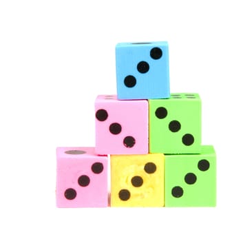 stack of colorful dices isolated on a white background