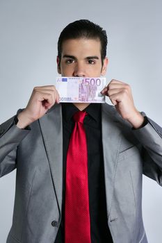 Formal young businessman portrait with 500 euro note on gray background