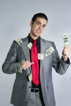 Businessman young with dollar notes suit and tie on gray background