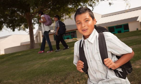 Happy Young Hispanic Boy with Backpack Ready for School.