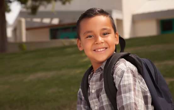 Happy Young Hispanic Boy with Backpack Ready for School.