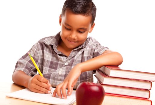 Adorable Hispanic Boy with Books, Apple, Pencil and Paper Isolated on a White Background.