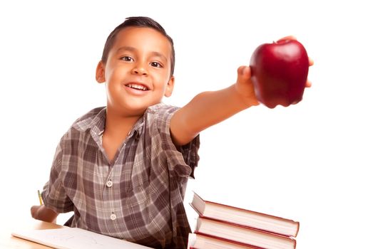 Adorable Hispanic Boy with Books, Apple, Pencil and Paper Isolated on a White Background.