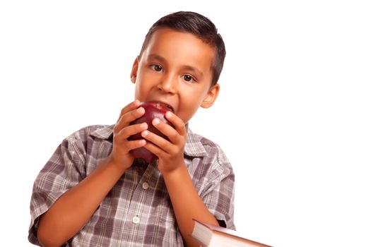 Adorable Hispanic Boy Eating a Large Red Apple Isolated on a White Background.