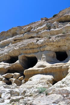 Travel photography: Cave, tombs, ancient roman cemetery in Matala, Crete.