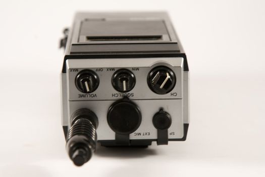 Closeup of handheld citizen band radio isolated on a white background