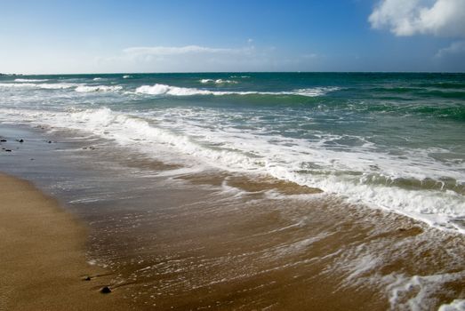 It is a beautiful beach with big waves in Taiwan.